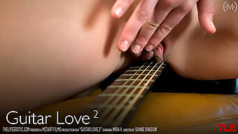 A Seductive Brunette Rock Music Enthusiast Employs Her Guitar As A Tool For Self-Pleasure