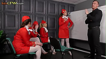 A Group Of Female Flight Attendants In Uniform Engage In Oral Sex And Handjob With A Man In A Bdsm Setting